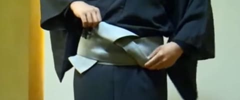 帯を中に入れ込む